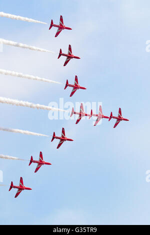 The nine members of the RAF Red Arrows aerobatics team performing at Duxford AIrshow, Duxford UK Stock Photo