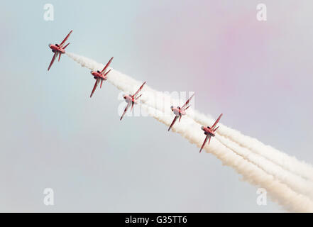 The red arrows RAF aerobatic team flying towards the camera, Duxford American Airshow, Duxford UK