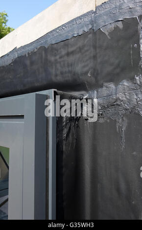 Construction detail of a metal window and damp proof membrane. June 2016 Stock Photo