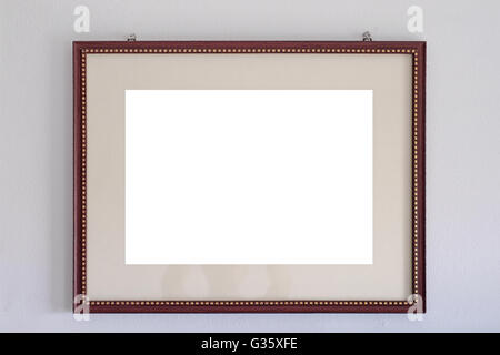 empty wooden picture frames on the cement wall Stock Photo