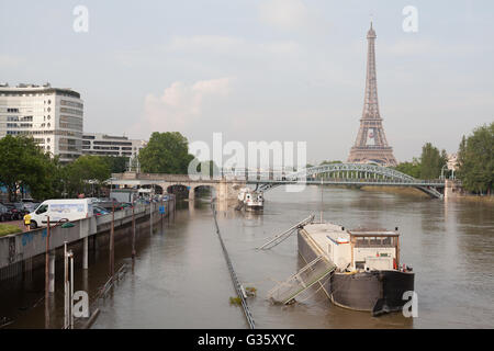 View of the Eiffel Tower of Paris, France from the riverwalk during flooding of early June 2016 Stock Photo