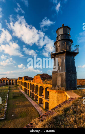 Harbor Light and the elegant ruins of Fort Jefferson on Garden Key in Dry Tortugas National Park, Florida, USA Stock Photo