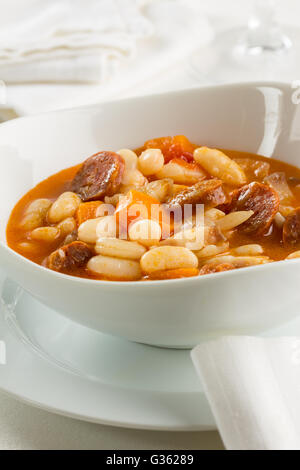 A bean stew with chorizo and carrot Stock Photo