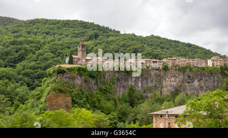 medieval village Castellfollit de la Roca on the edge of a mountain. Catalonia, Spain. Stock Photo