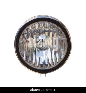 front view close up of a round vintage chrome headlight isolated on white background Stock Photo