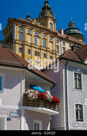 Melk Abbey appearing over the rooftops of the town, Lower Austria, Austria. Stock Photo