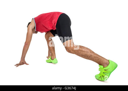 Male athlete in ready to run position Stock Photo