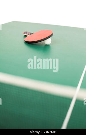 Table tennis racket with a ball Stock Photo