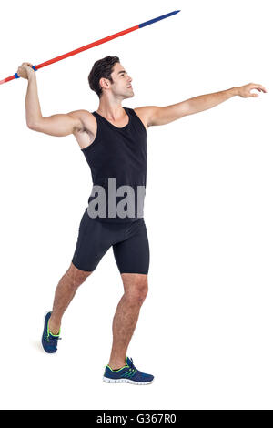 Male athlete preparing to throw javelin Stock Photo