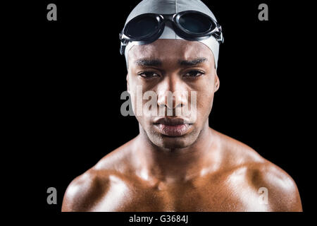 Portrait of swimmer in swimmingB goggles and swimming cap Stock Photo