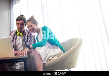 Businessmen using a computer Stock Photo