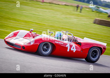1966 Lola-Chevrolet T70 Spyder with driver Philip Hall during the Whitsun Trophy race, 2015 Goodwood Revival, Sussex, UK. Stock Photo
