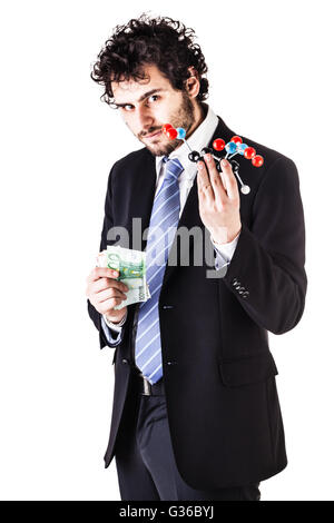 a businessman wearing a suit and a tie holding a trinitrotoluene tnt molecular model and money bills isolated over white Stock Photo