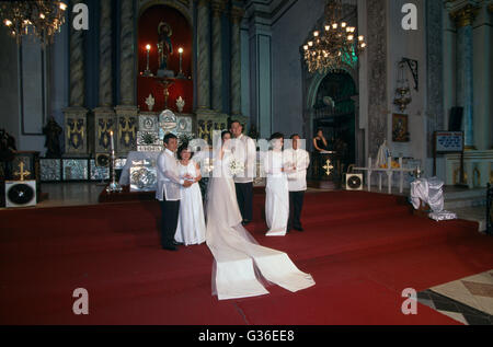 Wedding Couple At Altar St Augustine church, Intramuros, Manila, Philippines Stock Photo