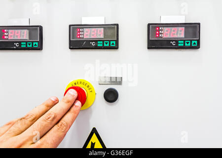 Activation or shutdown fuse box, with display for digital temperature gauge with warning sticker and an emergency shutdown Stock Photo