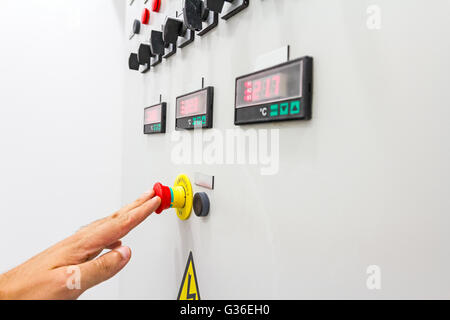 Activation or shutdown fuse box, with display for digital temperature gauge with warning sticker and an emergency shutdown. Stock Photo