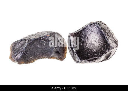 two small obsidian stones isolated over a white background Stock Photo