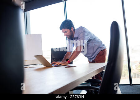 Businessman using a laptop Stock Photo