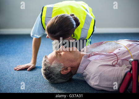 Female paramedic during cardiopulmonary resuscitation training Stock Photo