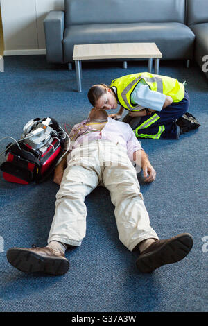 Female paramedic during cardiopulmonary resuscitation training Stock Photo