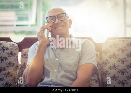 Senior man talking on mobile phone Stock Photo