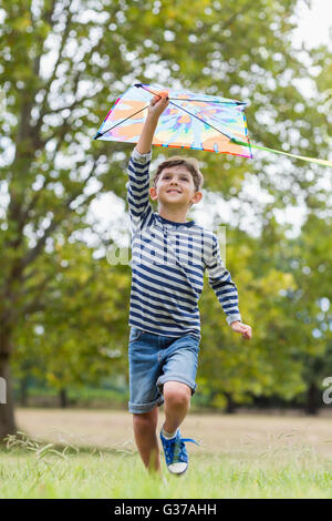 Boy playing with kite Stock Photo