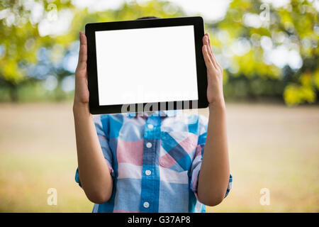 Girl showing digital tablet Stock Photo