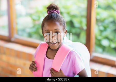 Portrait of happy schoolgirl smiling in classroom Stock Photo - Alamy