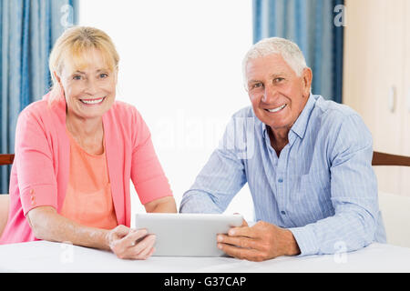 Senior couple using a tablet Stock Photo