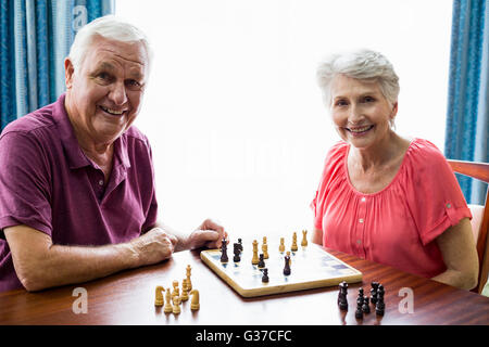 Senior couple playing chess Stock Photo