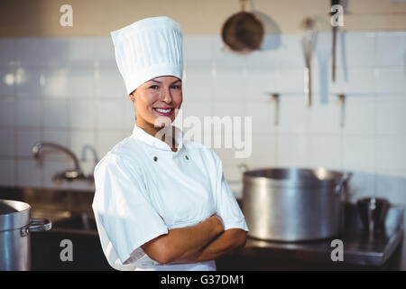 Portrait of happy chef standing with arms crossed Stock Photo