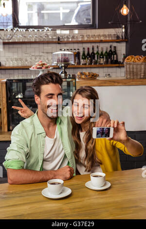 Funny couple taking a selfie Stock Photo