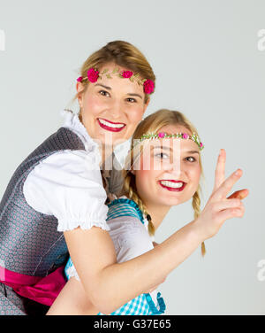 Happy girls in dirndl Stock Photo