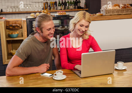 Couple using a laptop Stock Photo