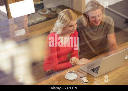 Couple using a laptop Stock Photo