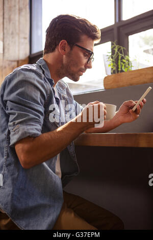 Man using a smartphone Stock Photo