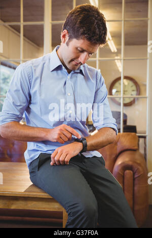 Business man looking his watch Stock Photo