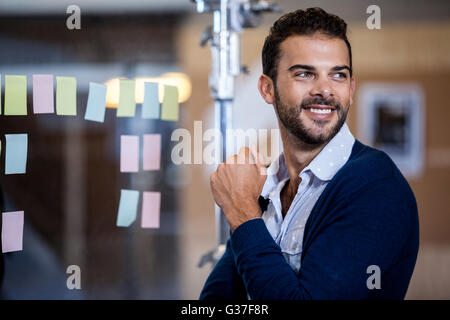 Businessman smiling and looking away Stock Photo