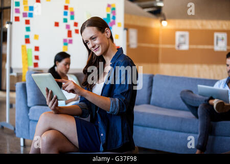 Businesswoman using a tablet computer Stock Photo