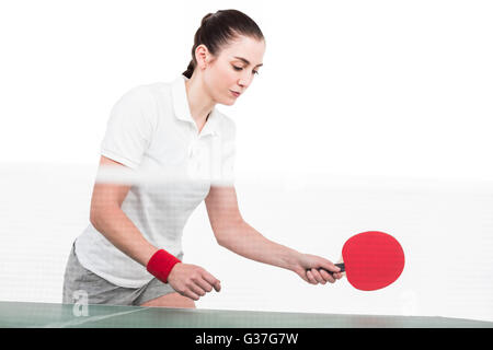 Female athlete playing ping pong Stock Photo