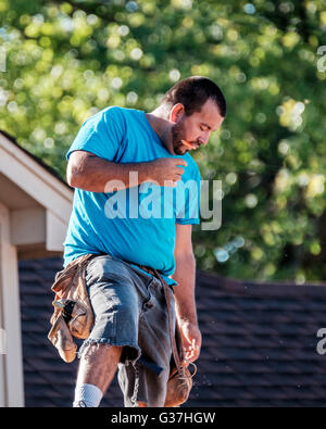 Hispanic man working on new construction in the USA. Stock Photo