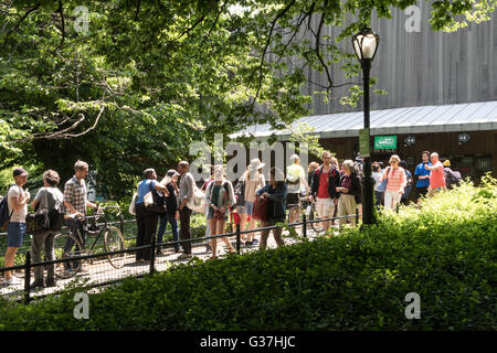 Free Ticket Lines at the Delacorte Theater in Central Park, NYC Stock Photo