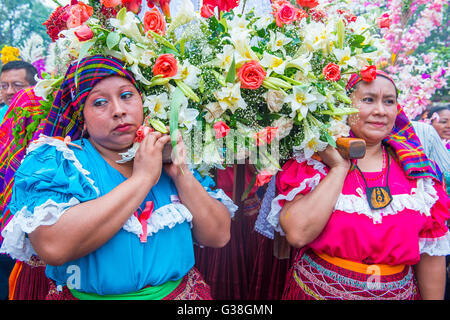 Salvadorian women participate in the procession of the Flower & Palm Festival in Panchimalco, El Salvador Stock Photo