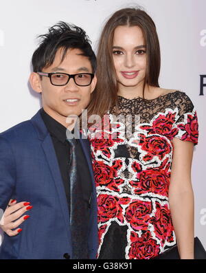 Hollywood, California. 7th June, 2016. HOLLYWOOD, CA - JUNE 07: Writer/director/producer James Wan (L) and actress Ingrid Bisu attend the premiere of 'The Conjuring 2' during the 2016 Los Angeles Film Festival at TCL Chinese Theatre IMAX on June 7, 2016 in Hollywood, California. | Verwendung weltweit © dpa/Alamy Live News Stock Photo