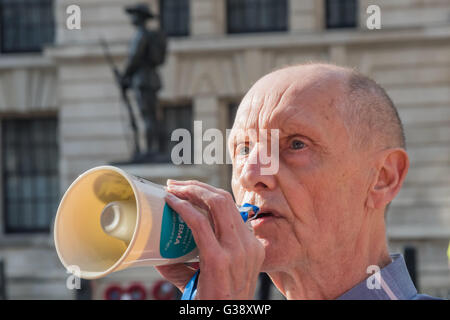London, UK. 9th June 2016. One of those who took part in the early years of gay liberation and the first Pride March in London speaks at the 'No Pride in War' protest. He says that the movement was based on peace and love and that celebrating and promoting institutions of war and those who profit from warfare globally is an affront to the values that Pride was built on. Peter Marshall/Alamy Live News Stock Photo