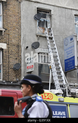 Green Lanes, London, UK. 10th June 2016. Fire engines and crew attend ...