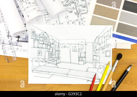 architect’s  workspace with architecture hand-drawn sketch and rolls of plans Stock Photo