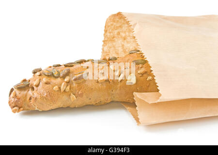 Integral roll in paper bag on white background Stock Photo