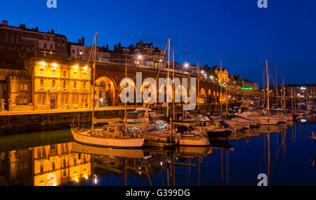 The Royal Harbour Marina Ramsgate on the Kent coast, illuminated at dusk. Stock Photo