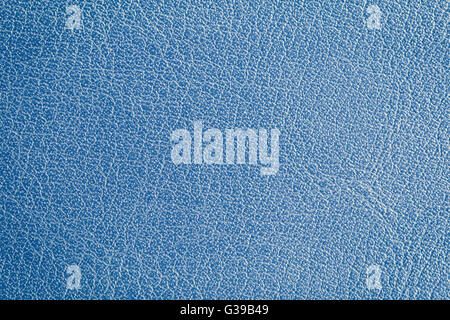 Background of close focus on blue skin of artificial waxed leather with striped made from synthetic plastic. Color tone grading Stock Photo